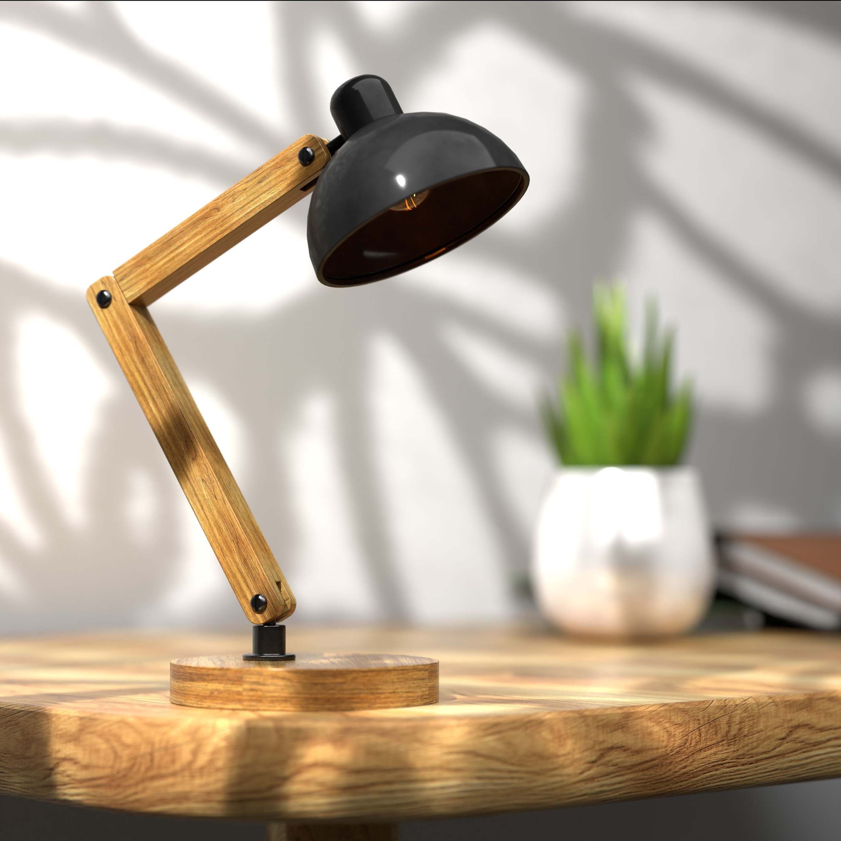 Office desk with a wooden desk lamp on an oak table